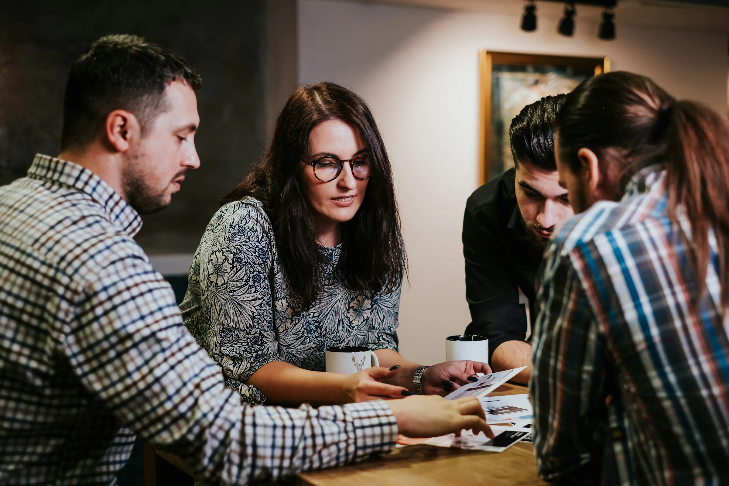 team members in an office discussing